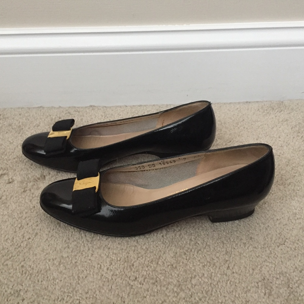 Ferragamo women's black leather flats, size 7 AA